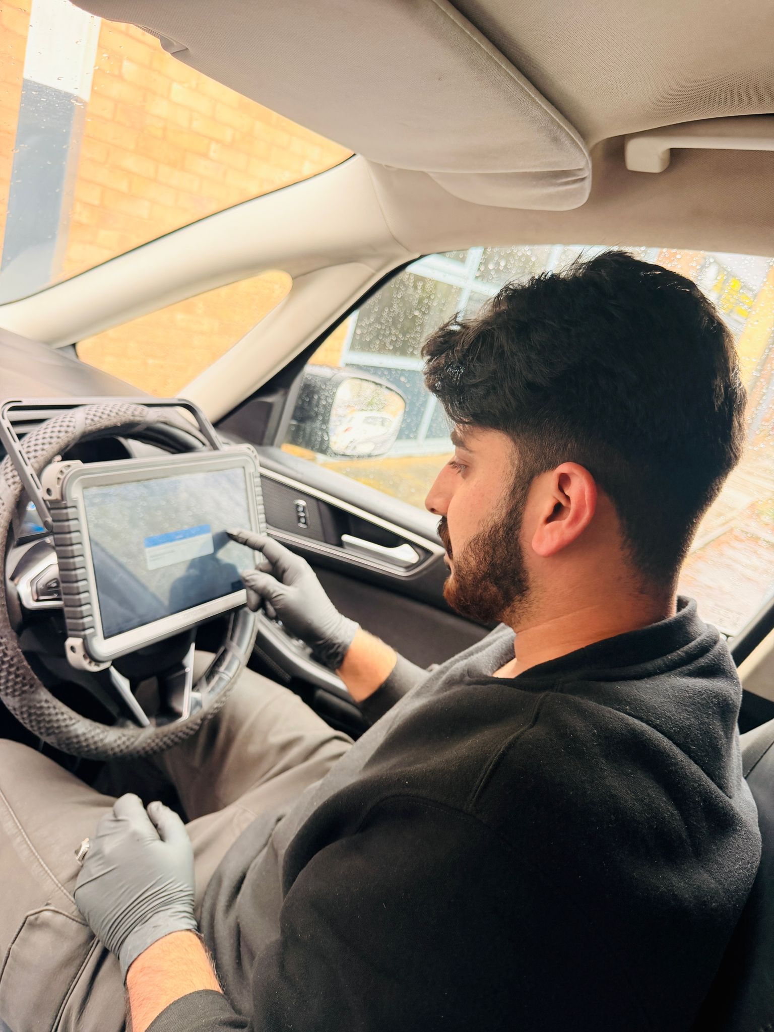 Mechanic running OBD Diagnostics